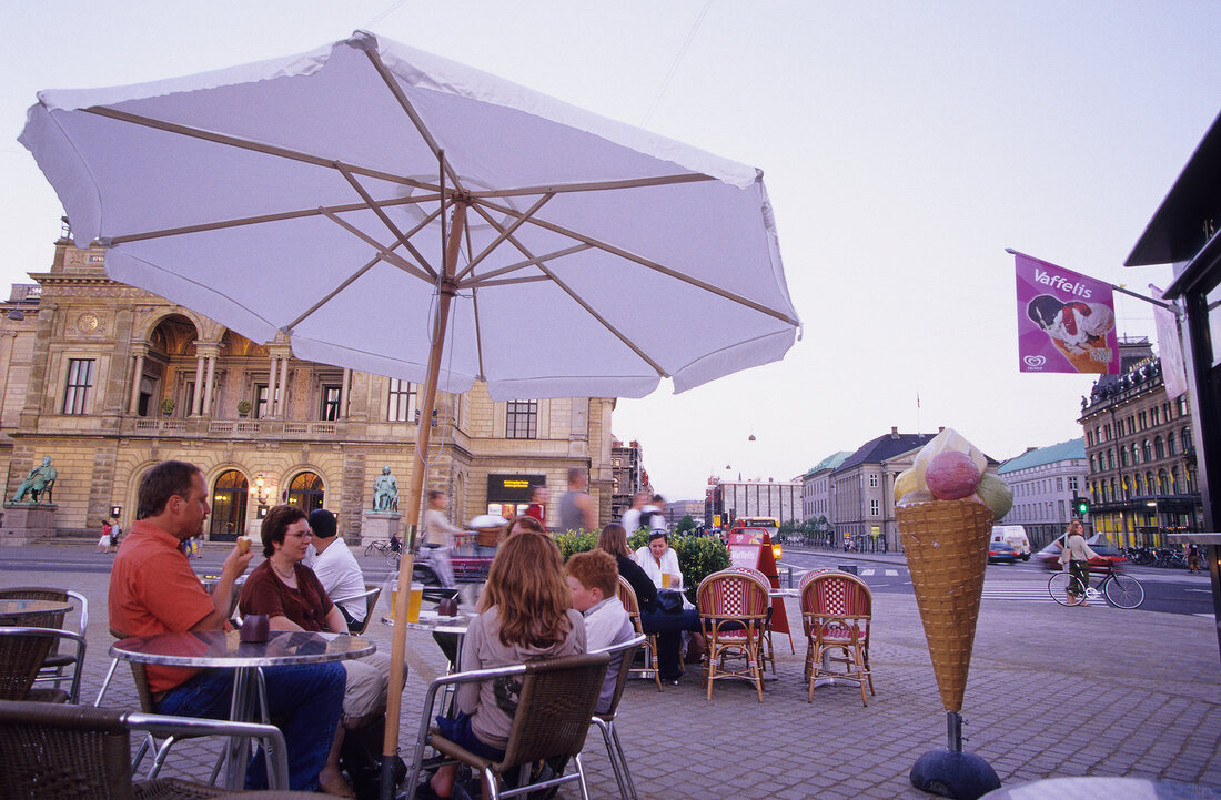 People sitting in ice-cream parlour of Cafe Terrace at Kongens Nytorf, Copenhagen, Denmark