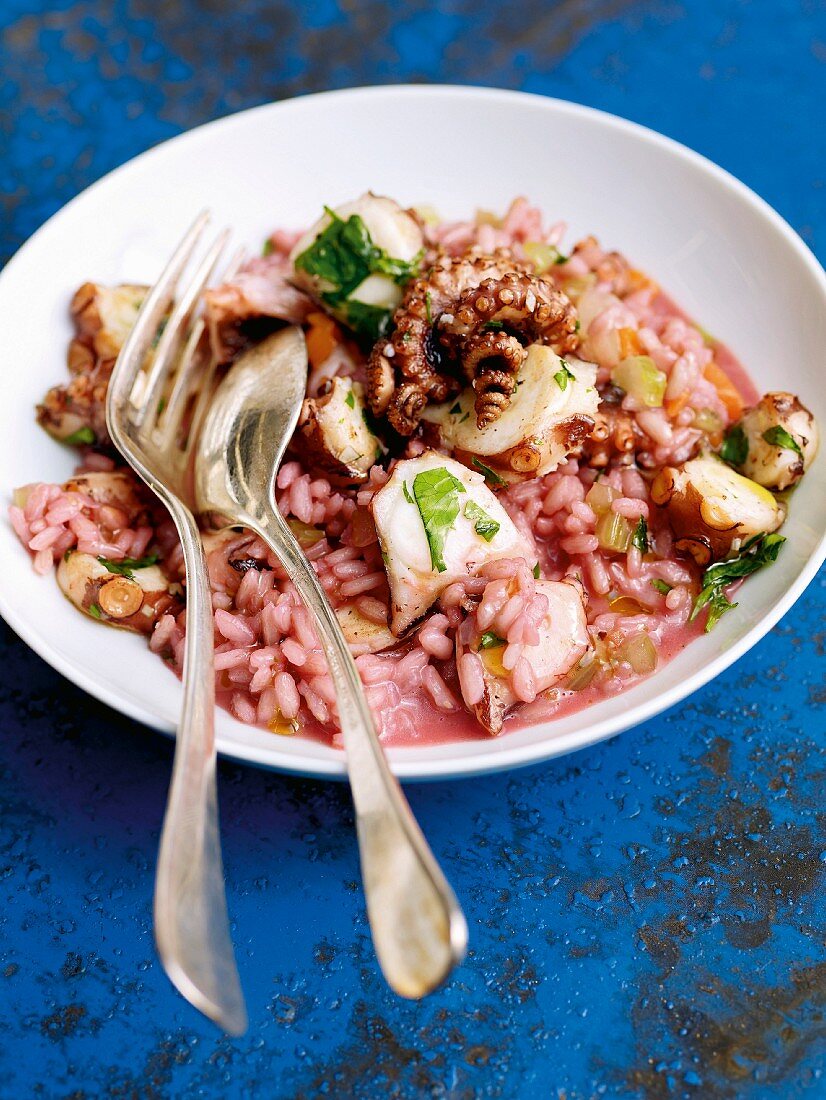 Red wine risotto with octopus and beetroot juice