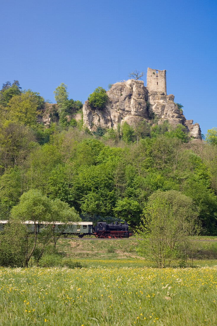 View of train and rock mountain in Franconian Switzerland, Bavaria, Germany