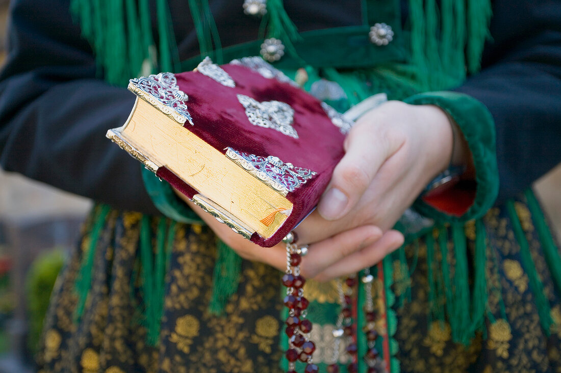 Close-up of hands holy book, Bavaria, Franconian, Switzerland