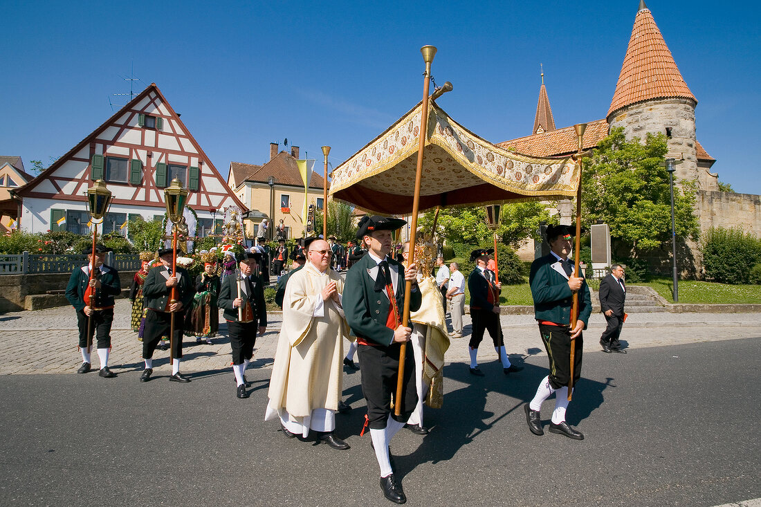 Procession on road in Franconian Switzerland, Bavaria, Germany