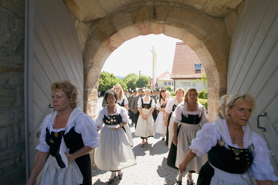 Procession on road in Franconian Switzerland, Bavaria, Germany