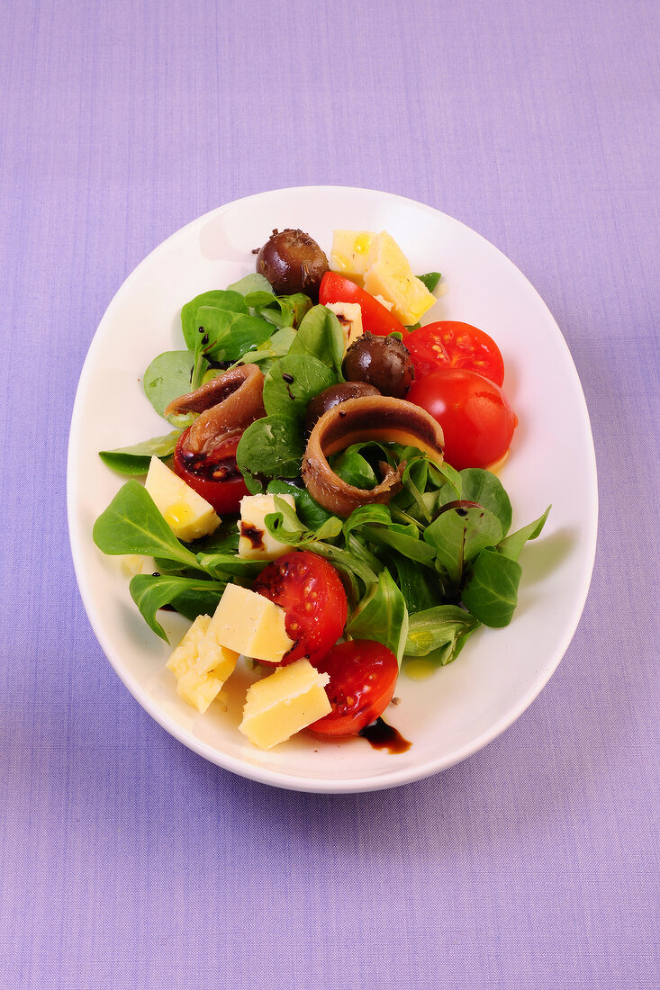 Mediterranean salad with corn on plate