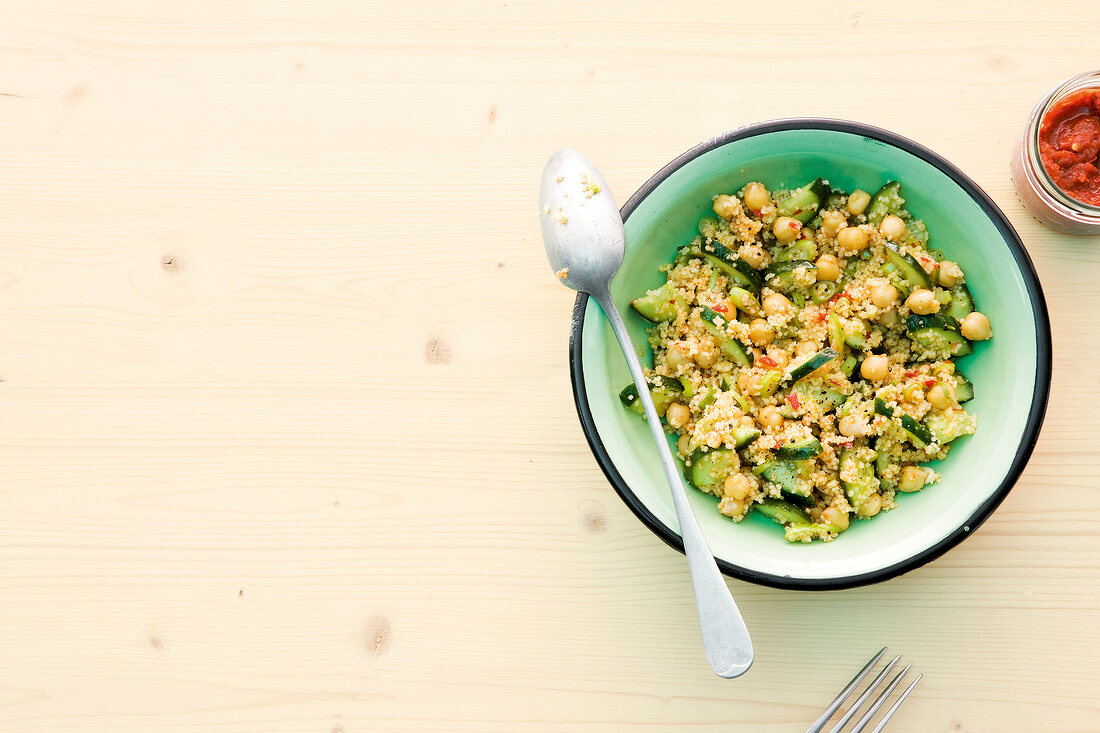 Couscous salad with chickpeas in bowl