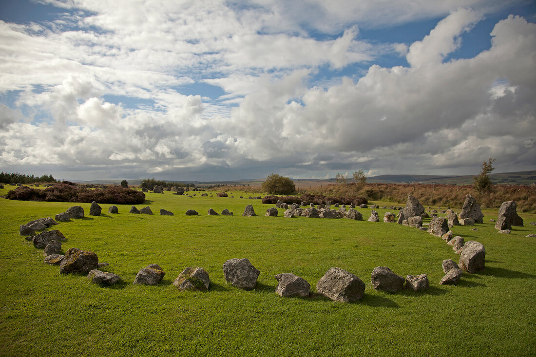 View of Tyrone stone circles on green landscape, Ireland, UK