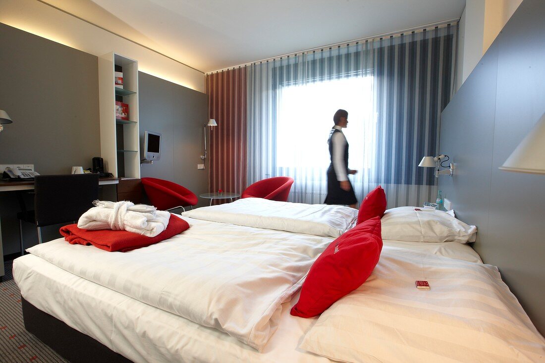 Housekeeper at room in hotel at Vaihingen, Stuttgart, Baden-Wurttemberg, Germany