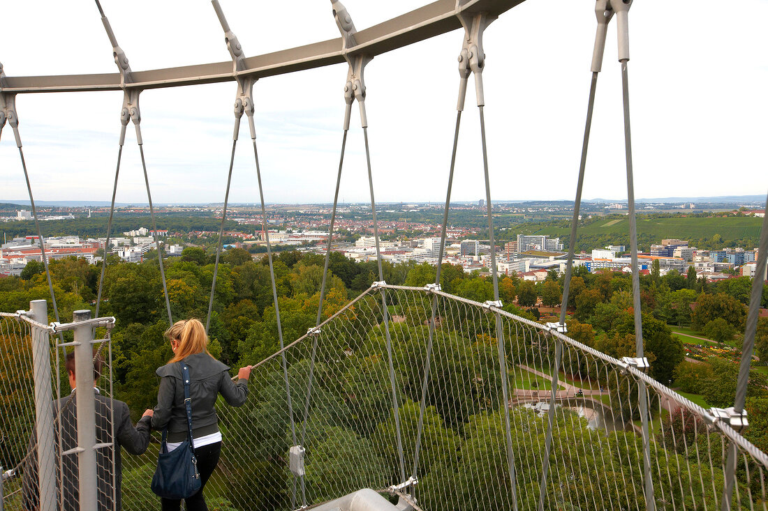 Man and woman climbing downstairs from Killesbergturm at Stuttgart, Germany