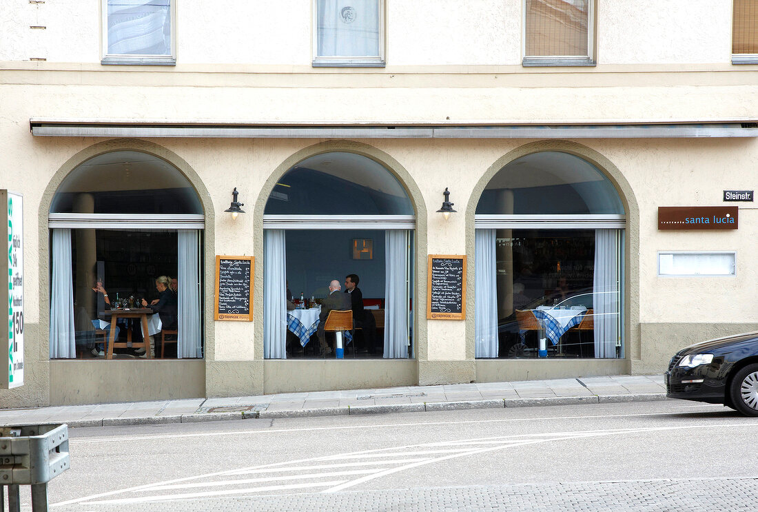 People sitting in Restaurant Santa Lucia in Stuttgart, Germany