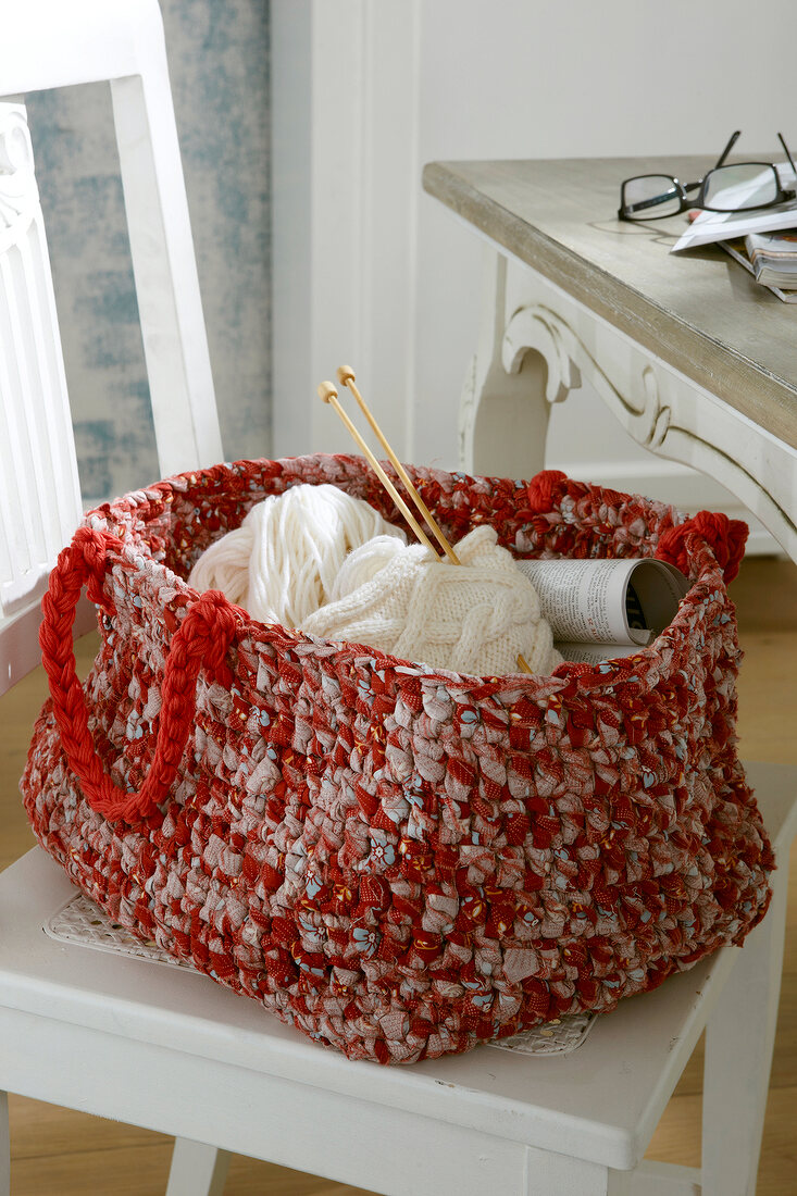 Red crocheted bag with white wool