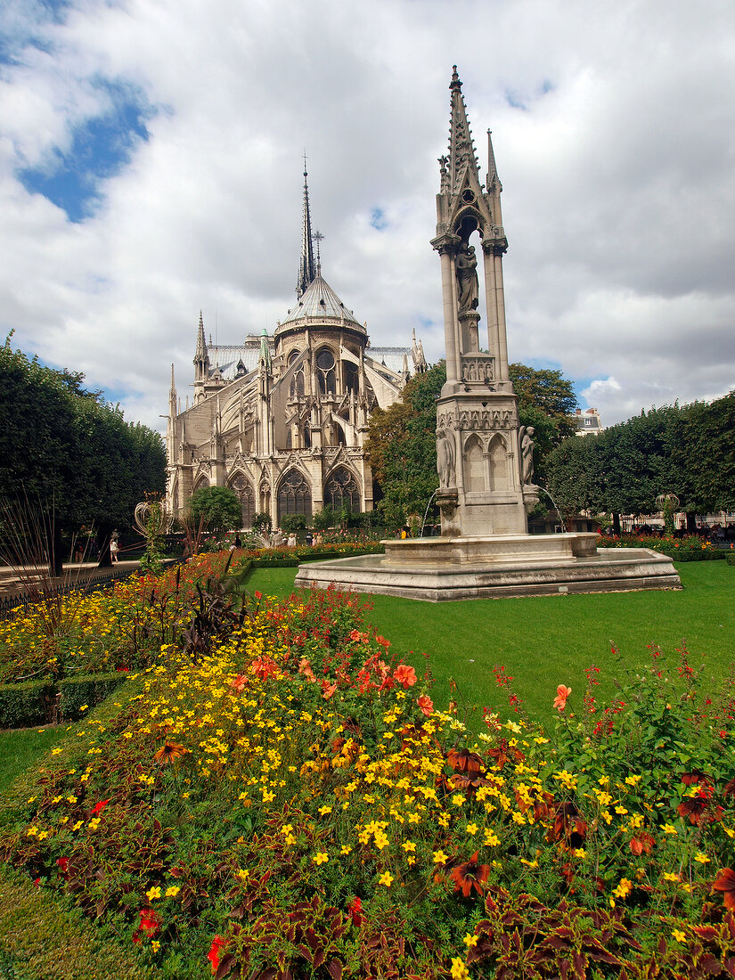 View of Notre-Dame Cathedral and garden in Paris, France