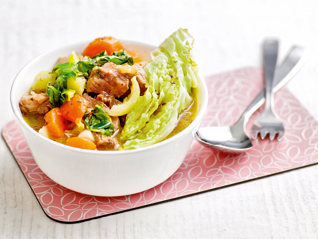 Savoy stew with lamb in bowl