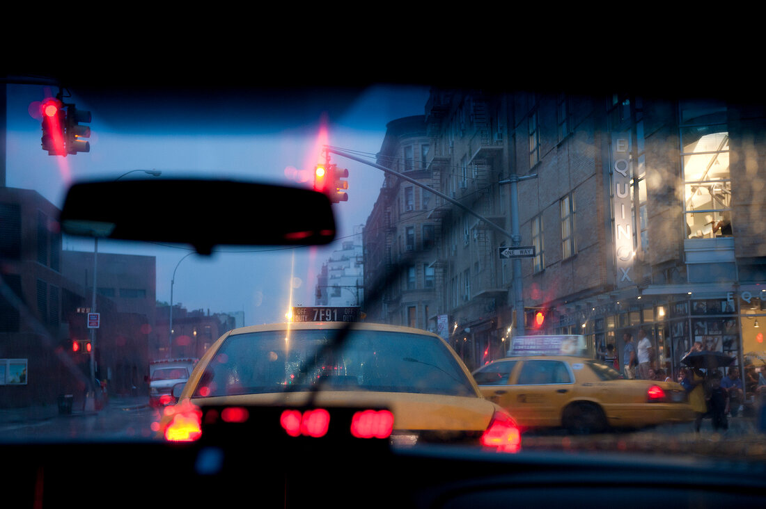 View from car of yellow cab in New York, USA