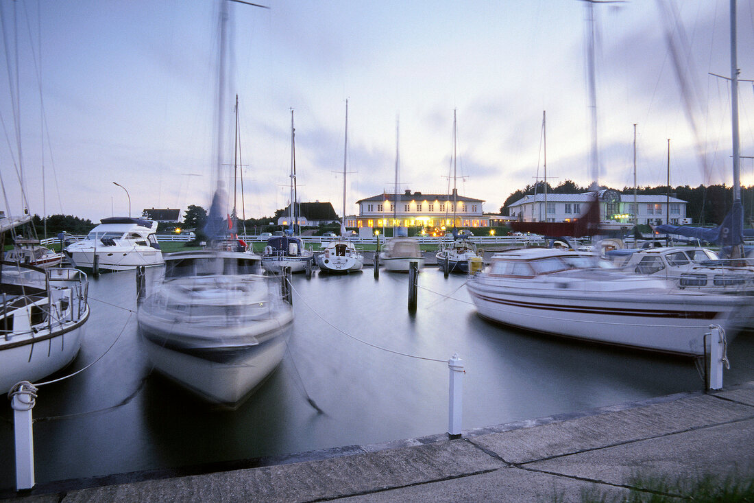 View of boats at port of Wadden sea in Munkmarsch, Sylt, Germany, blurred motion