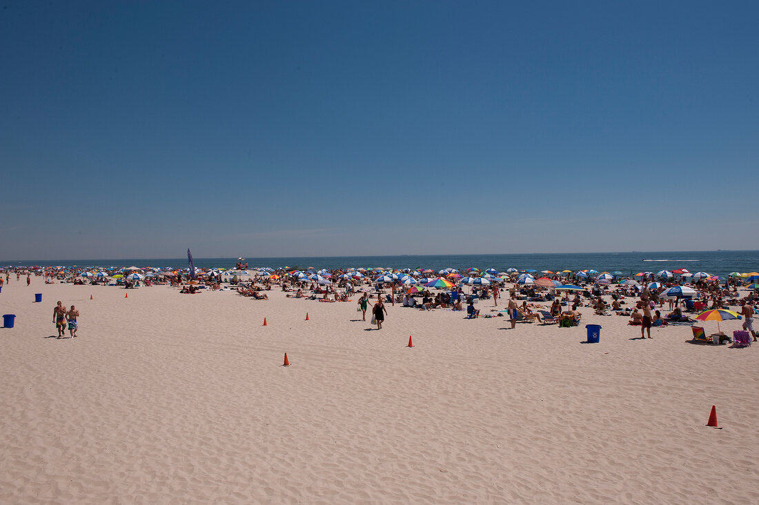 View of people on beach in New York, USA