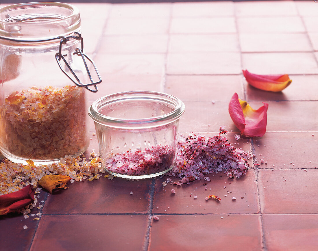 Ingredients flavoured with salt and flower in glass jar