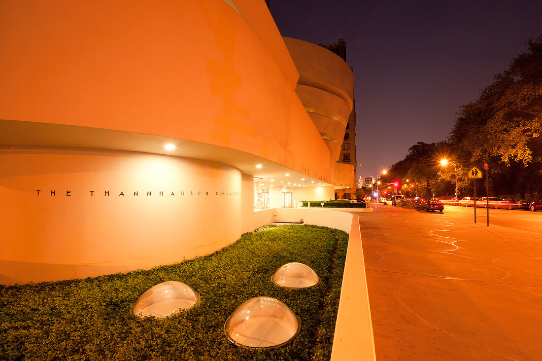 Exterior of Solomon R. Guggenheim Museum at night in New York, USA