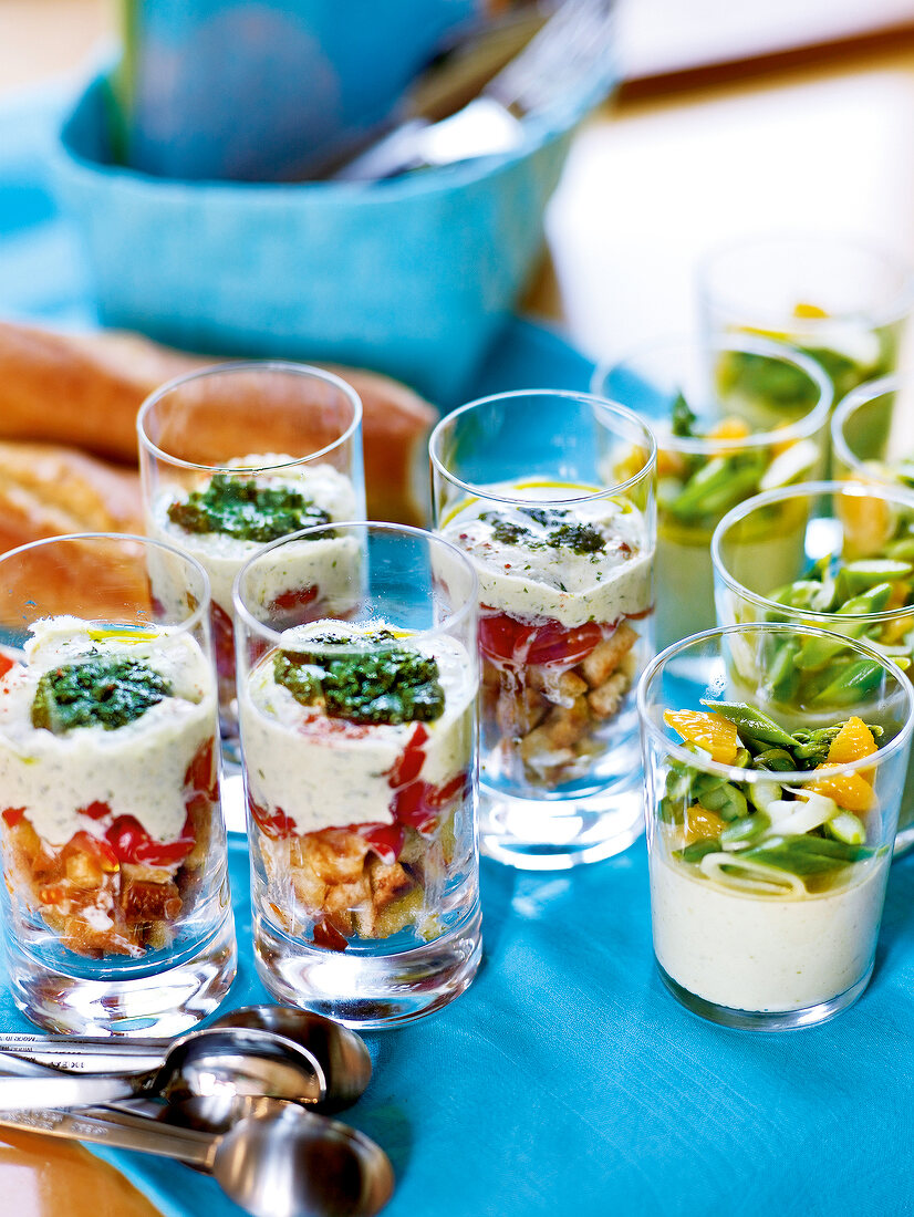 Panzanella salad and avocado mousse in glass