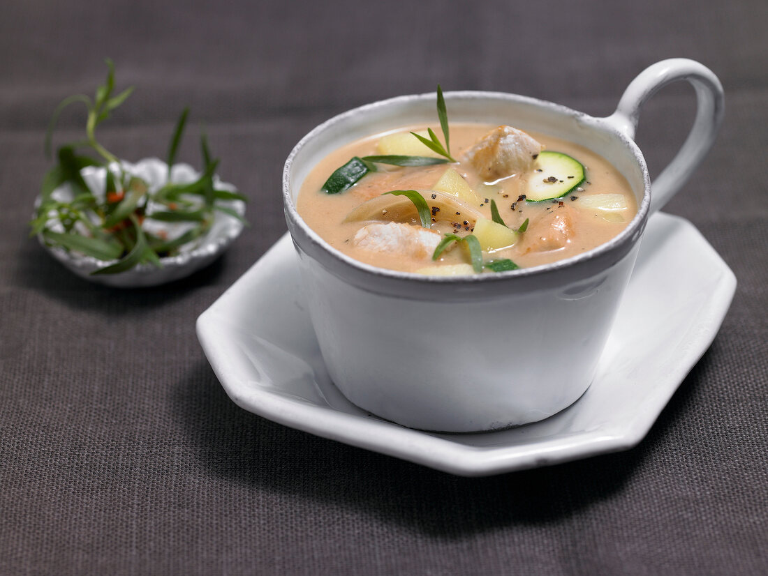 Chicken stew with zucchini in cup