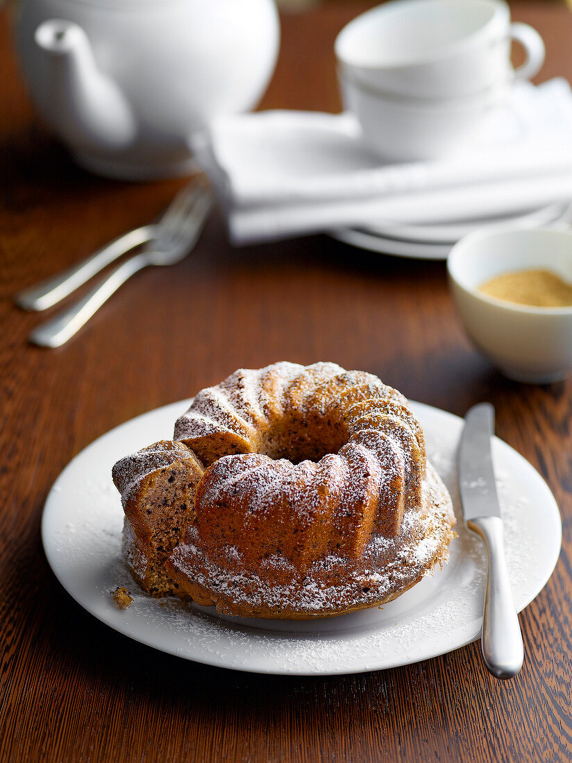 Classic mulled wine bundt cake with icing sugar on plate