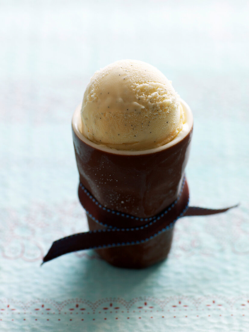 Close-up classic vanilla ice-cream with vanilla dip in cup