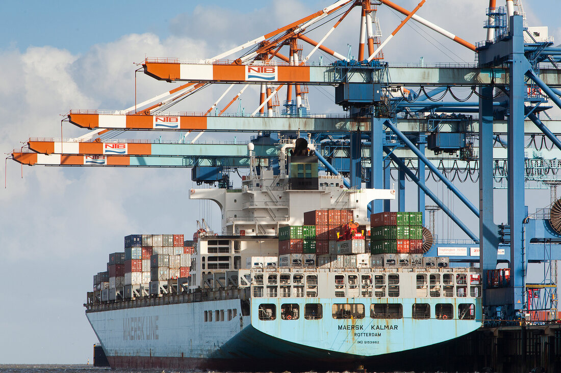 Containers being loaded on ship with cranes, Bremerhaven, Bremen, Germany