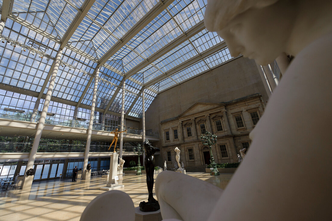 View of hall with glass roof and wall at Metropolitan Museum, New York, USA