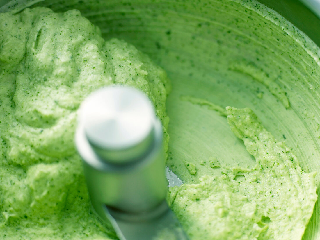 Close-up of green ice cream in ice cream machine
