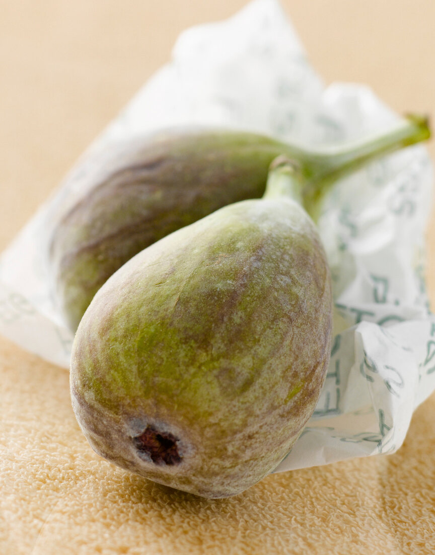 Close-up of two figs