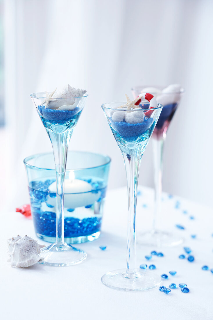 Liquour glasses decorated with shells and starfish