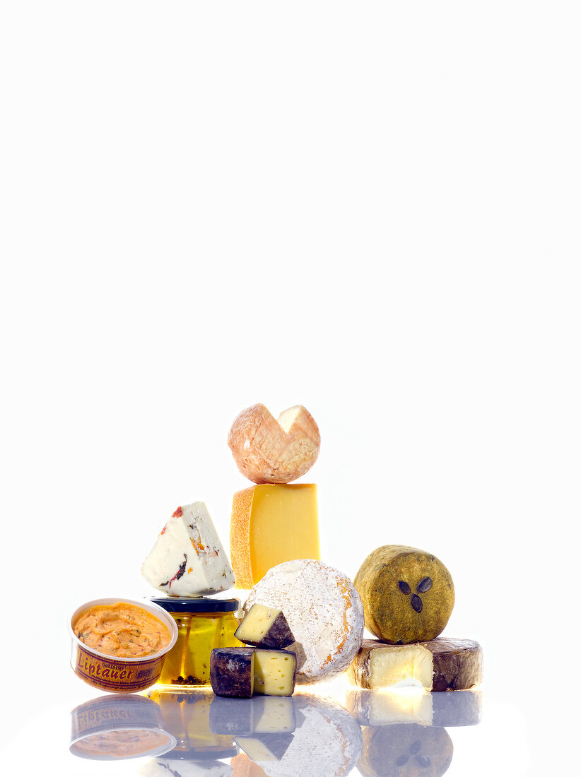 Various types of cheese against white background from wine regions, Austria
