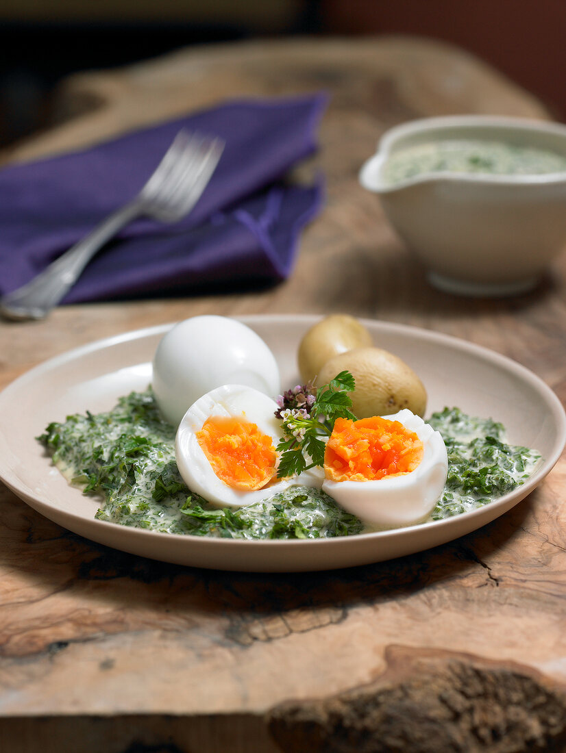 Eggs with green sauce on plate