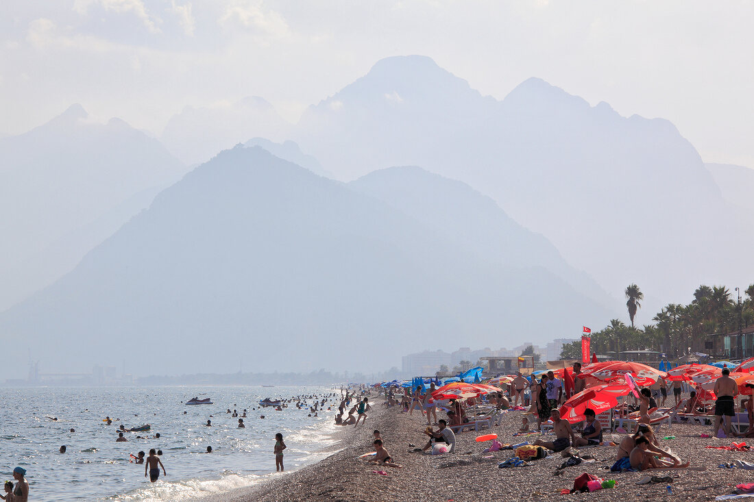 Tourists relaxing on Konyaalti beach, Antalya, Turkey