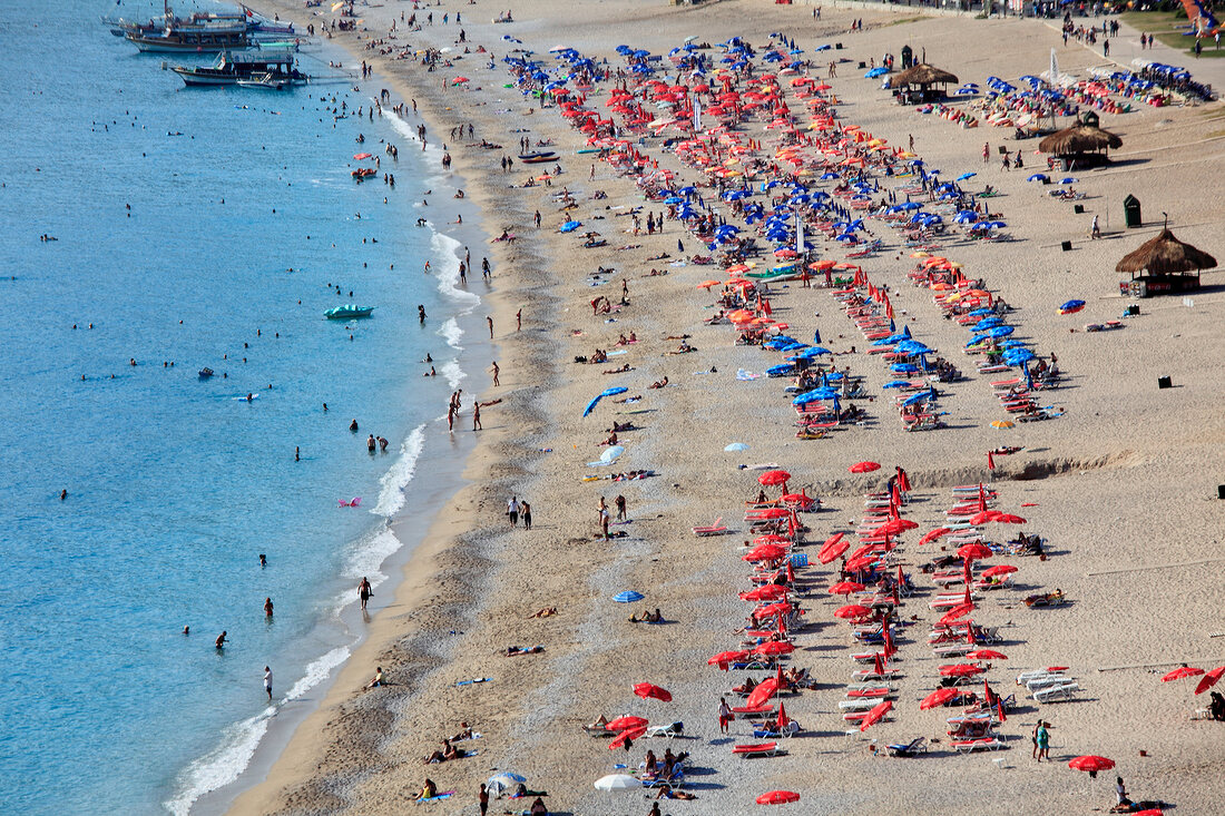 Tourist relaxing on beach in Oludeniz, Aegean, Turkey