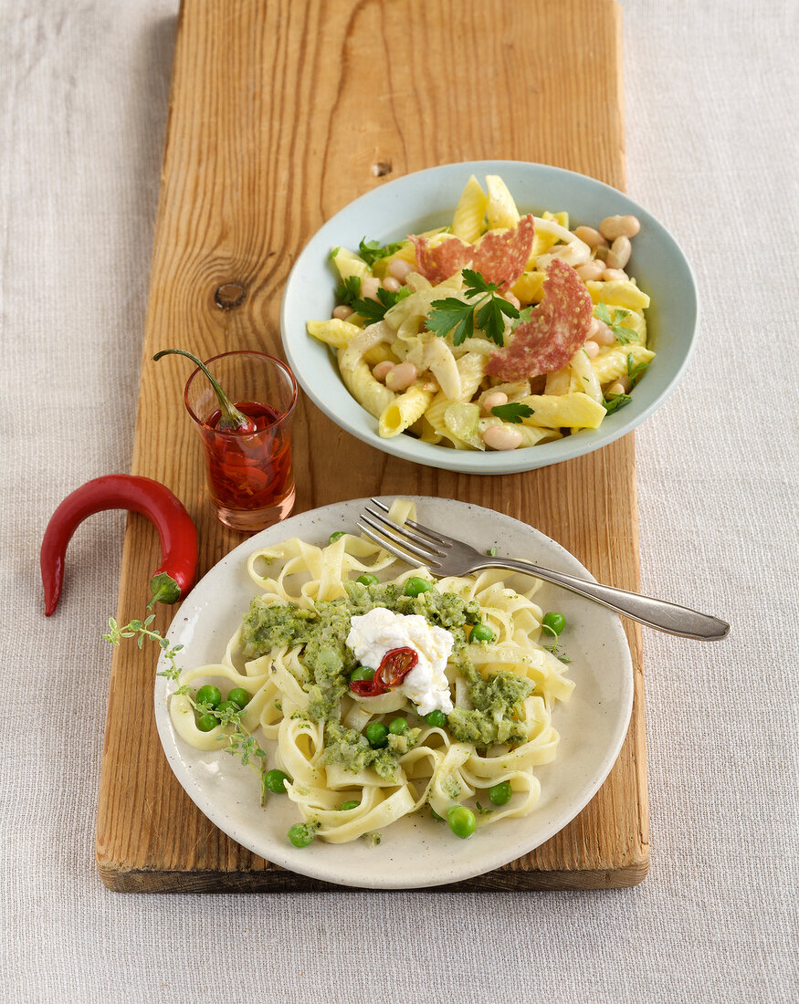 Pasta with broad beans and broccoli on plate