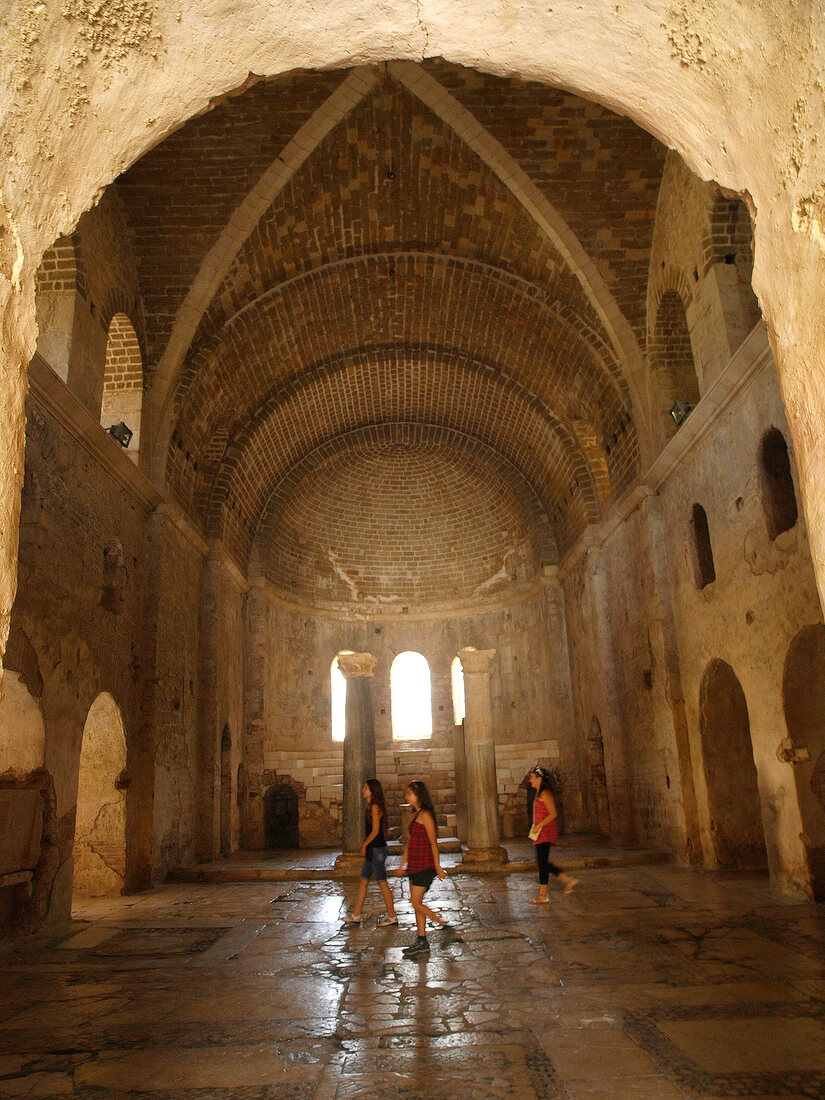 Three tourist in St. Nicholas Church, Demre, Turkey