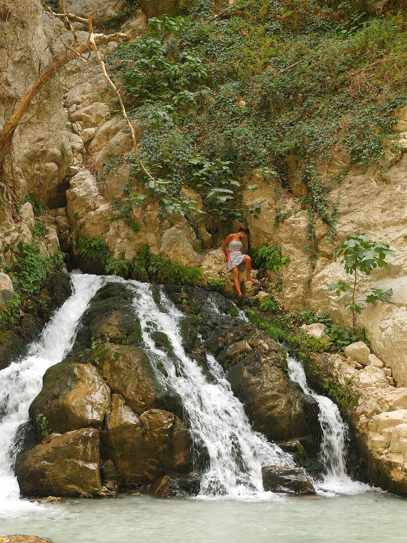 People enjoying in waterfall at Saklikent Canyon in Mugla province, Turkey