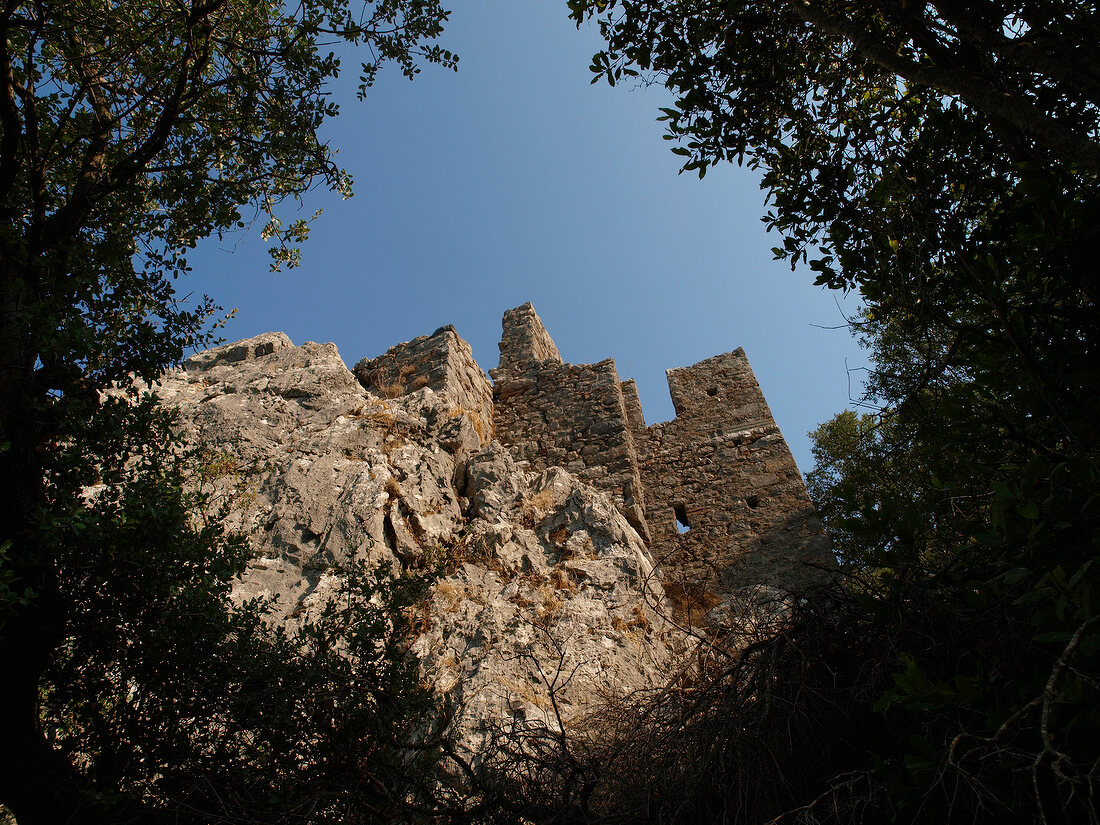 Low angle view of ruined city of Olympos from forest, Lycia, Turkey