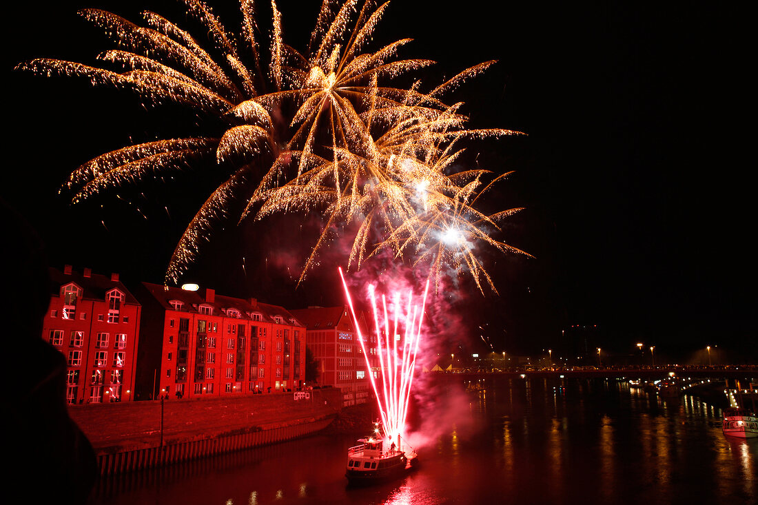 Fireworks on ferry at night, Bremen, Germany