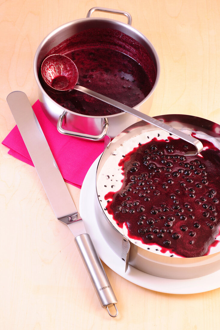 Blueberry with cream in casserole for preparation of desserts