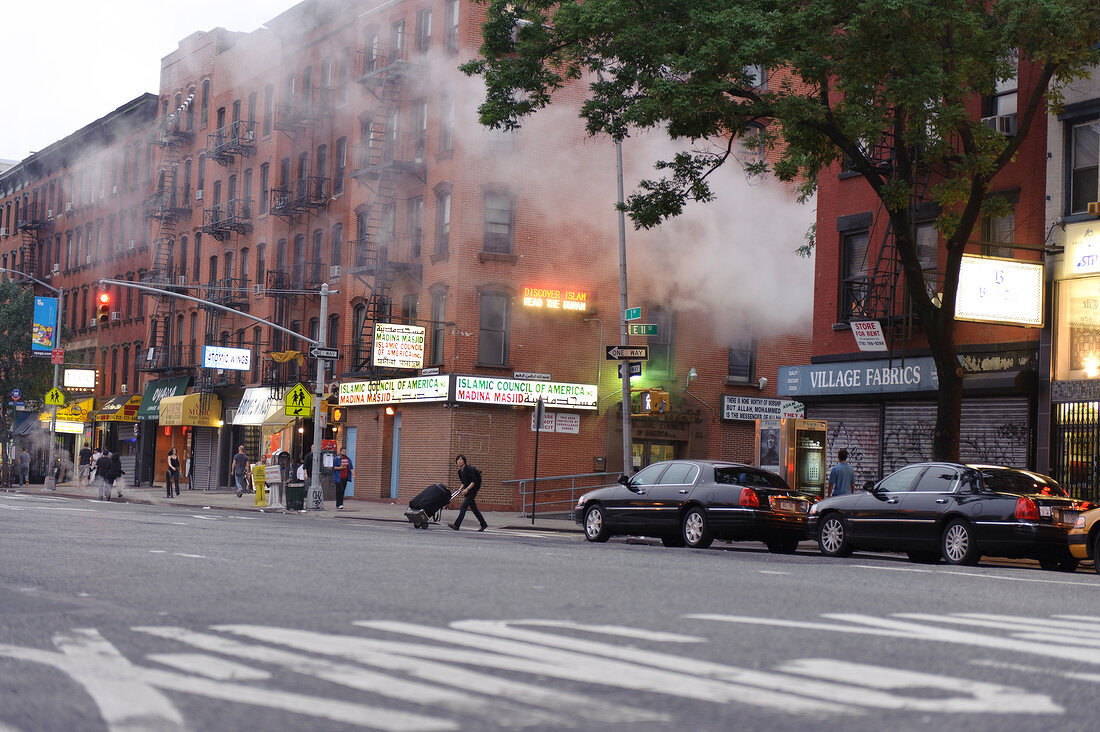 View of building on fire in East Village, New York, USA