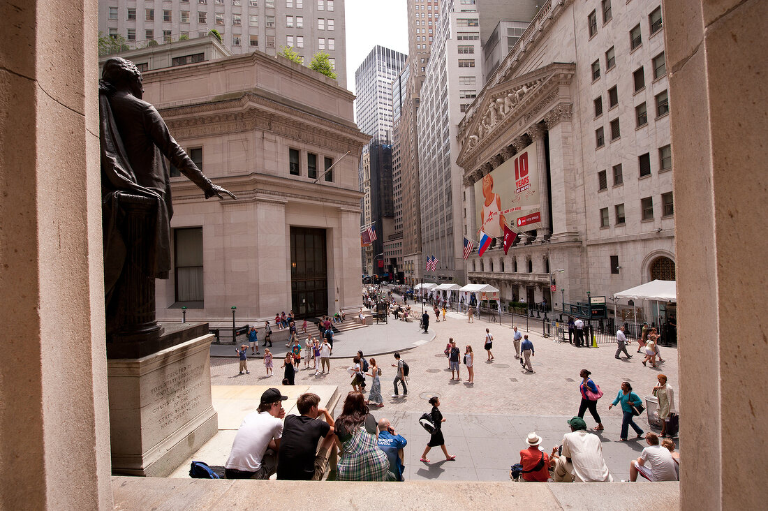 People outside New York Stock Exchange, New York, USA