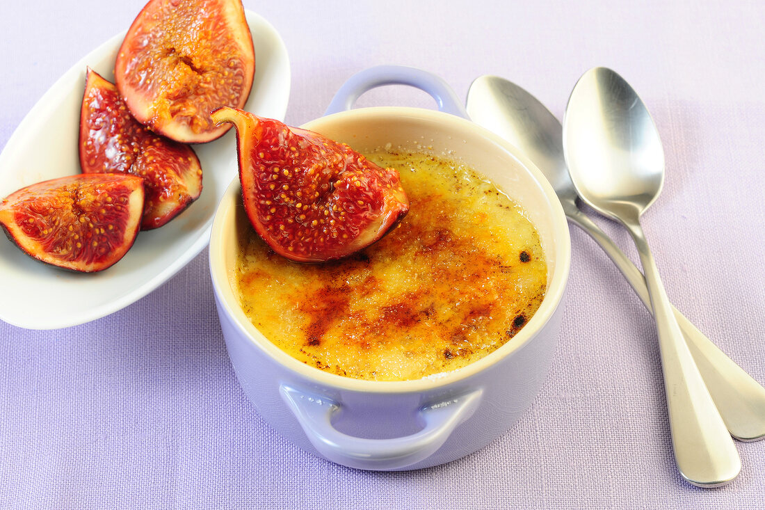 Creme brulee with figs in serving dish