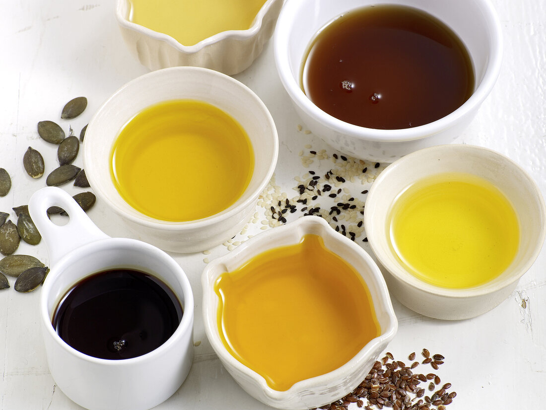 Various types of oils in bowls