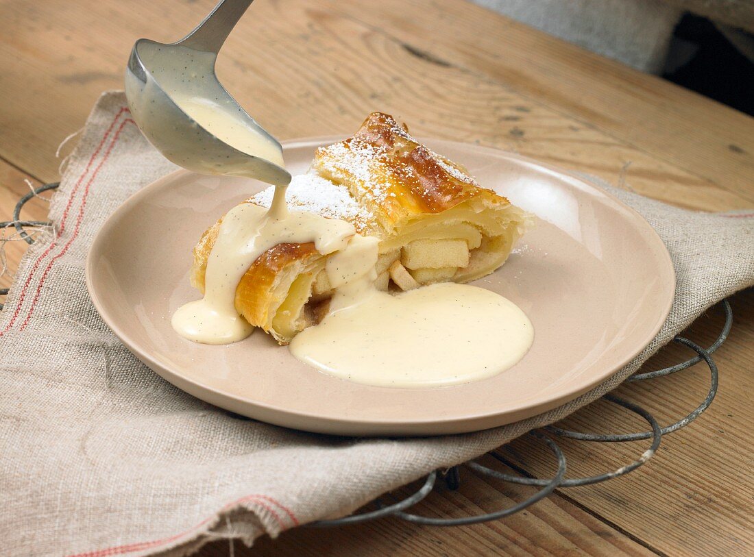 Apple strudel with vanilla sauce