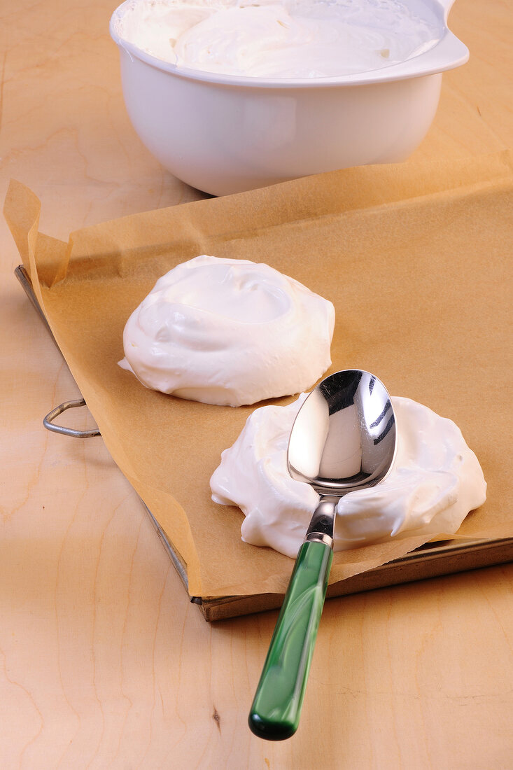 Mini pavlovas being made on baking dish, step 2