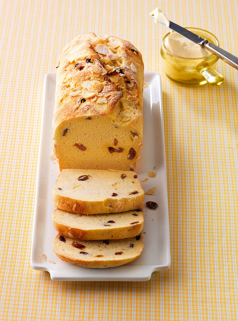 Baked paschal raisin bread sliced on tray