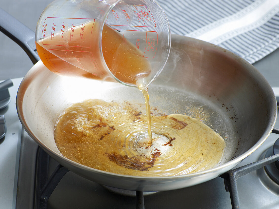 Pouring pan drippings in frying pan, step 1