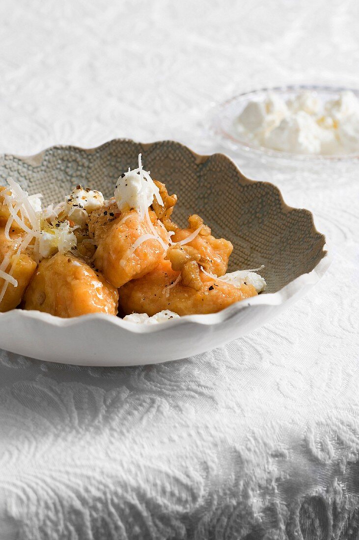 Pumpkin gnocchi with ricotta and nuts