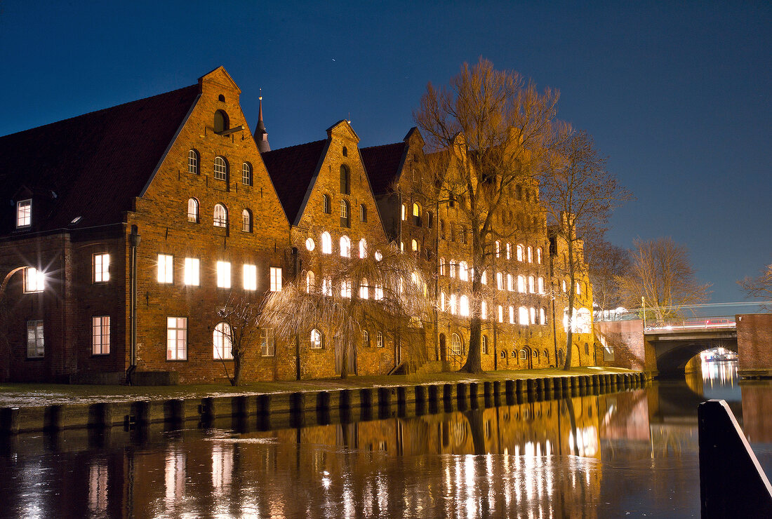 Night view of illuminated Travelodge Lubeck salt warehouse, Baltic Sea Coast