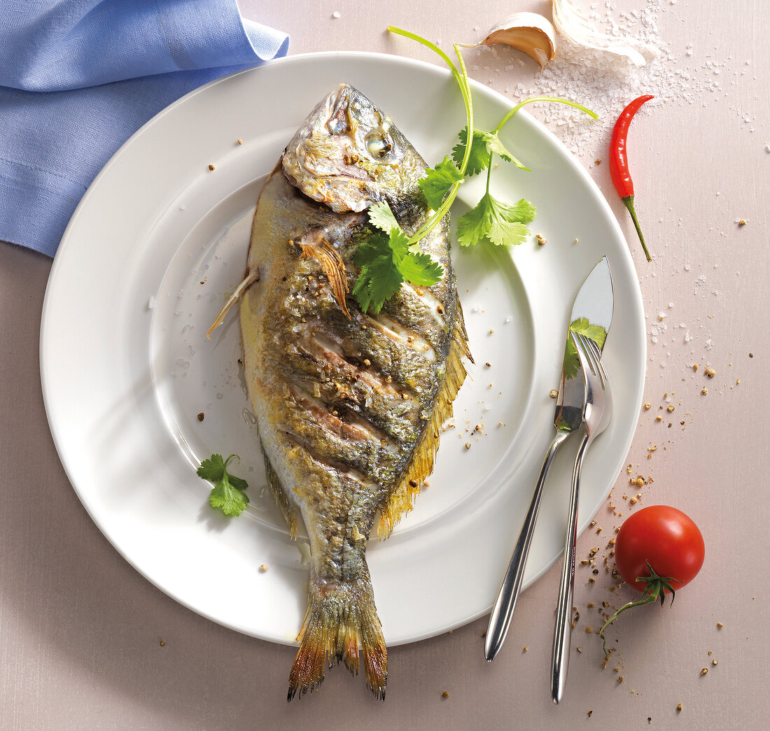 Fried sea bream with whole on plate 